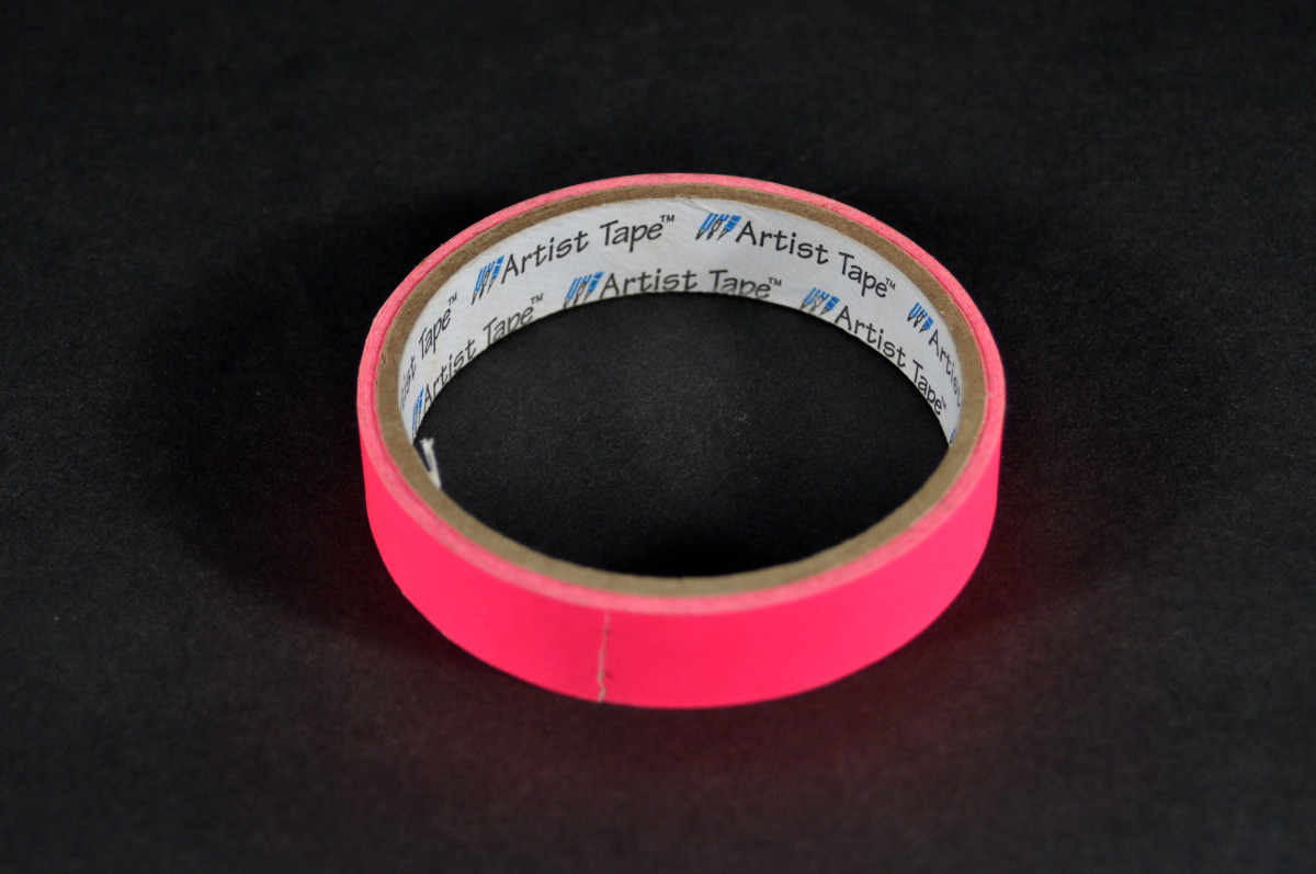 Artists tape representing security.