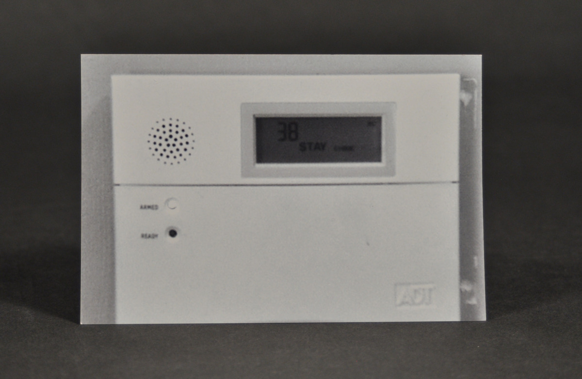 A photo of an alarm system representing security.