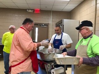 The Grateful Shed cooked BBQ at an event.