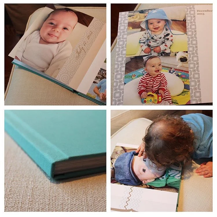"reading" our new @helloshortcake album of Cam's first year. yes, he's kissing a photo of himself. 😘