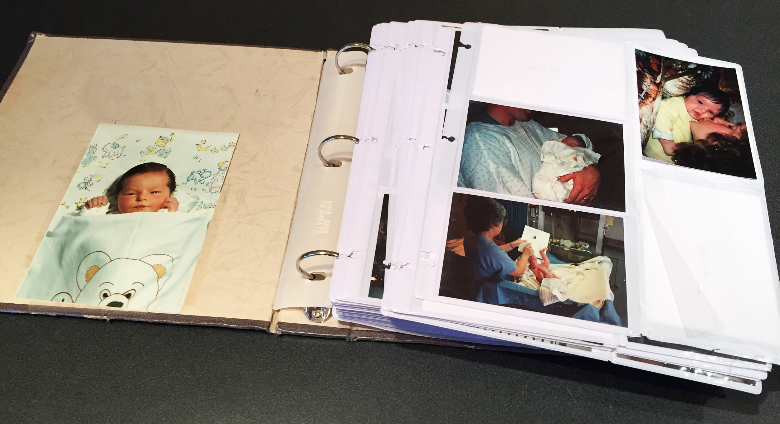 My baby album in all its glory, even though there are photos missing and pages falling out.