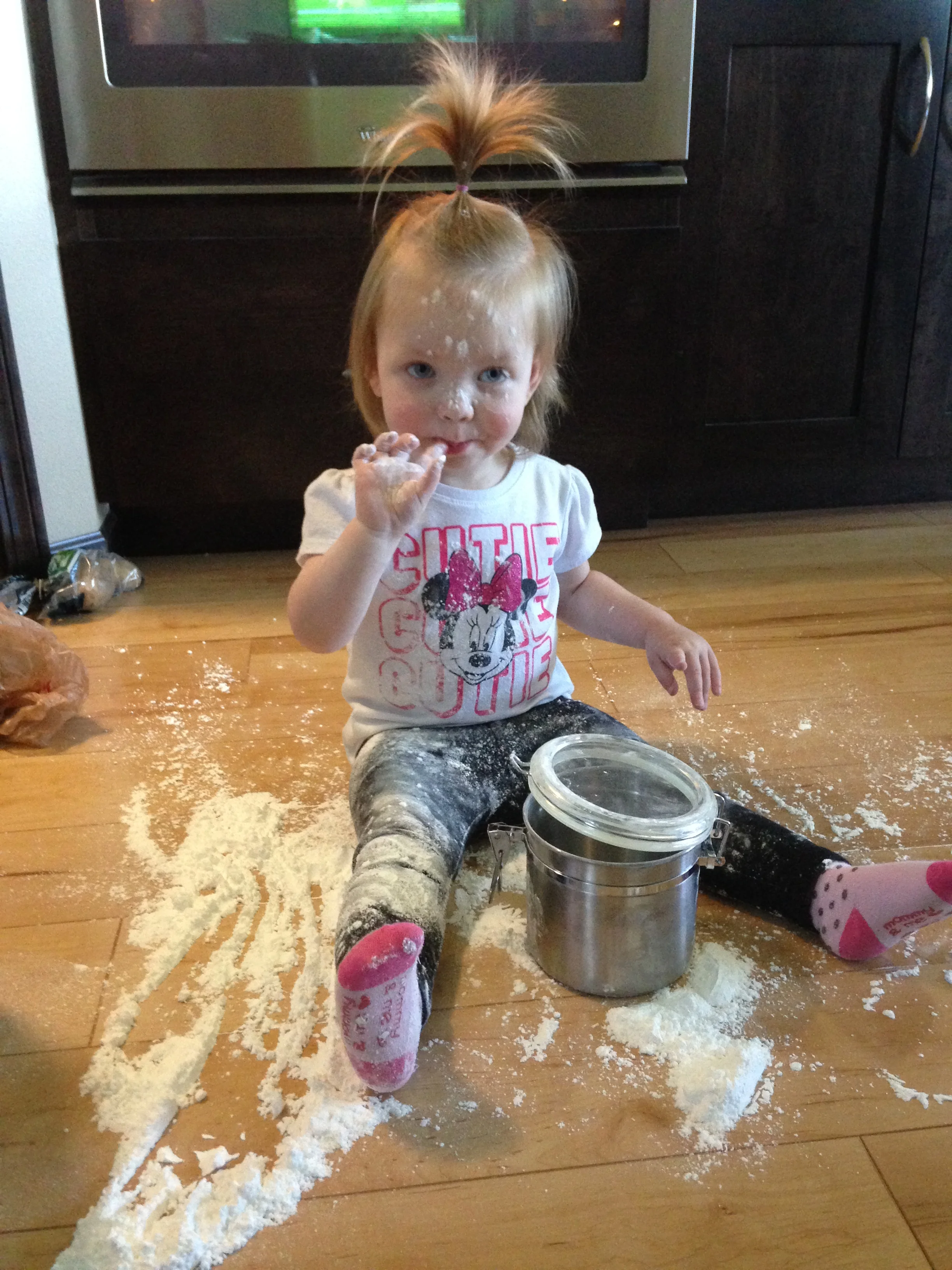 My niece Lauren (age 2.5 at the time) discovering powdered sugar is fun to make art with and also quite delicious!