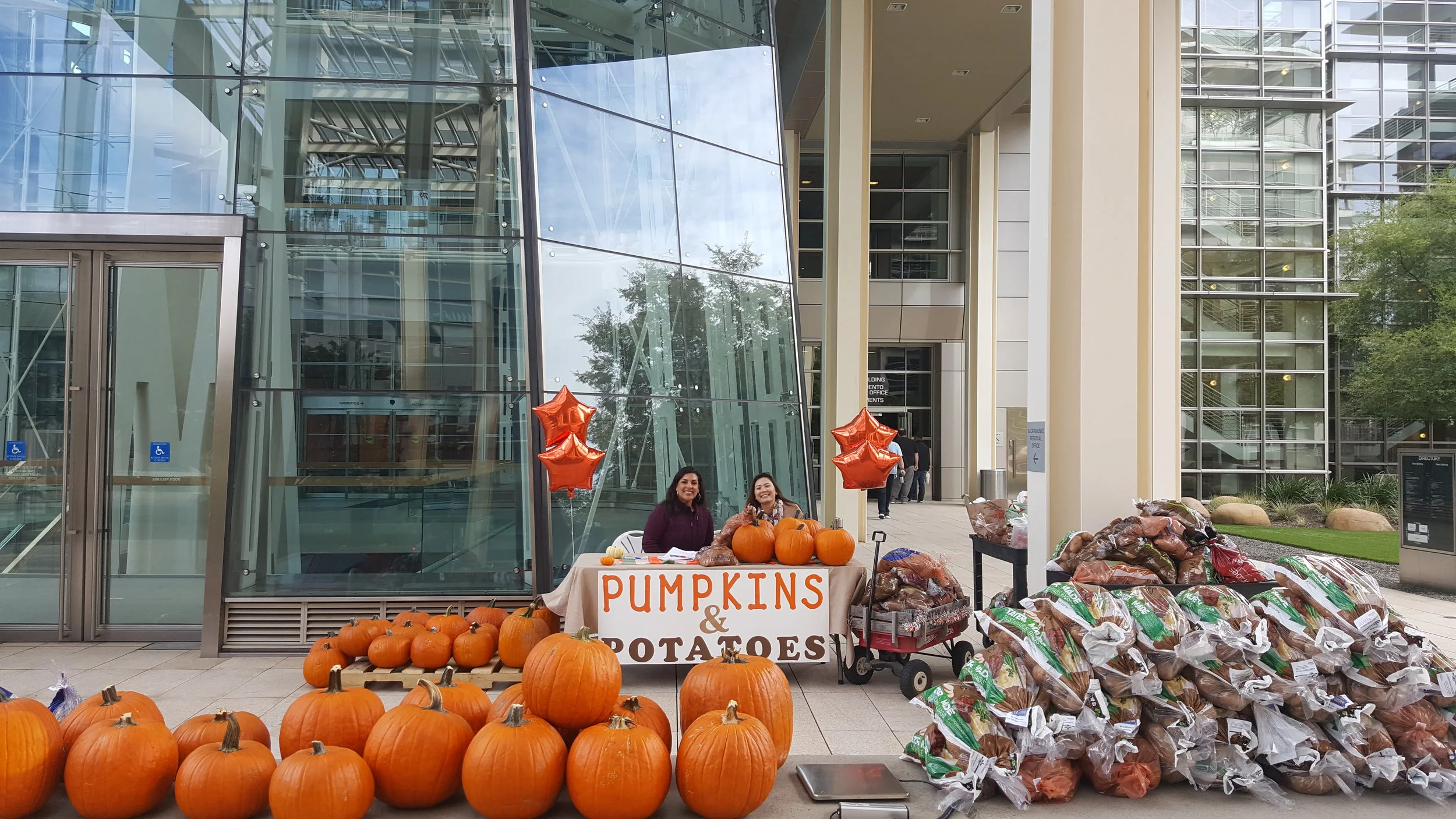 CalPERS staff hosting a pumpkins and potatoes food drive.