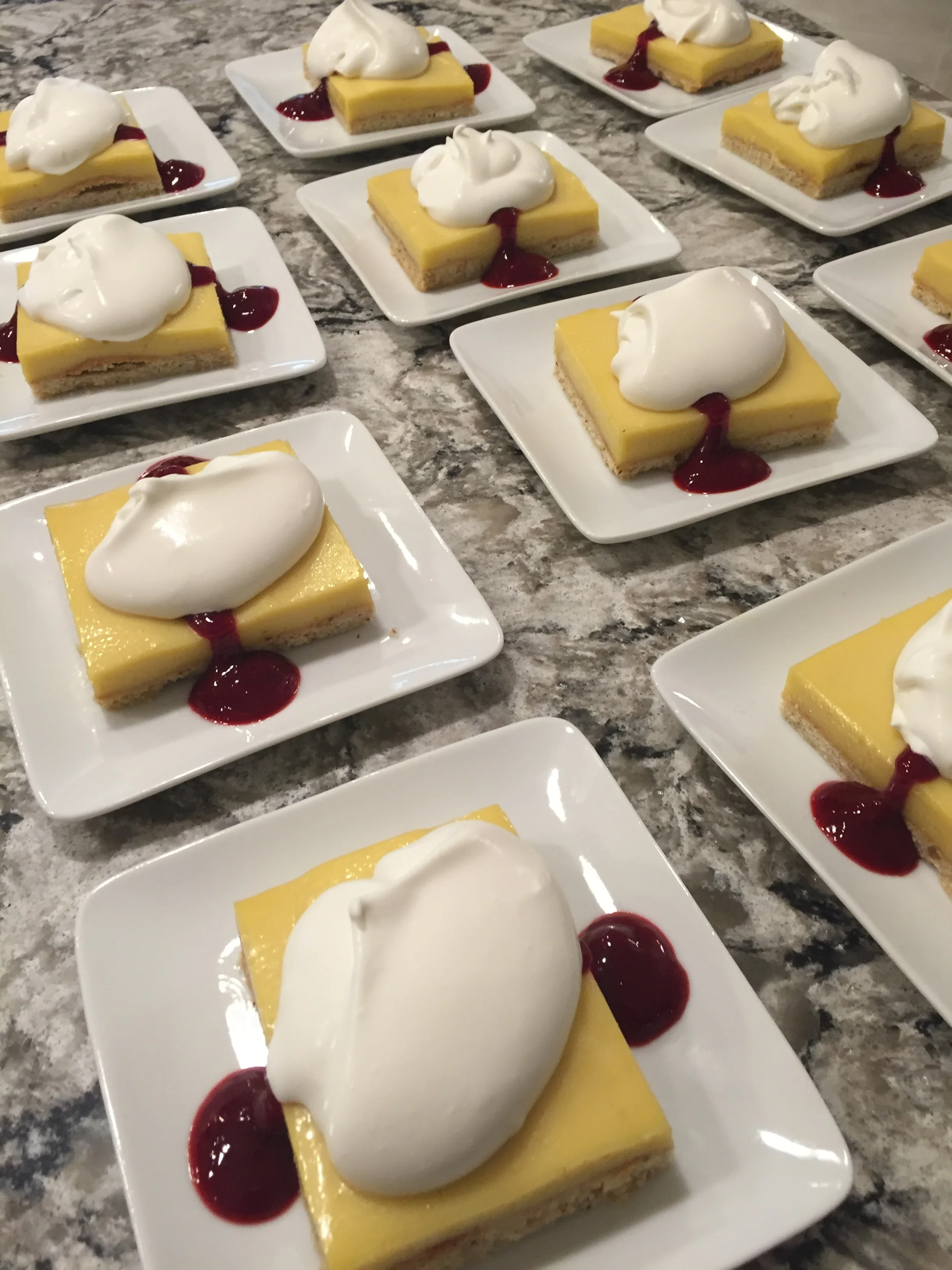 Lemon Tart with Cream and Raspberry Sauce
