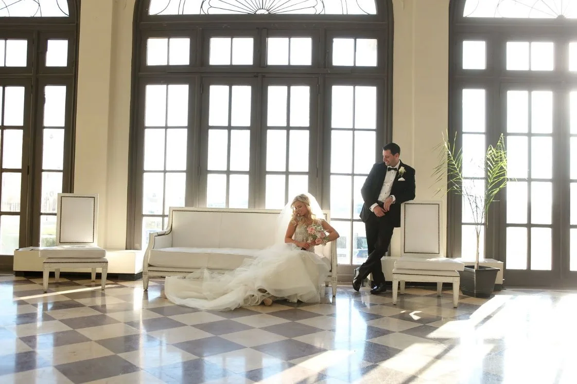 NJ Editorial Wedding Photo of a Bride and Groom in the sunny lobby at the Berkeley Oceanfront Hotel in asbury park, New Jersey