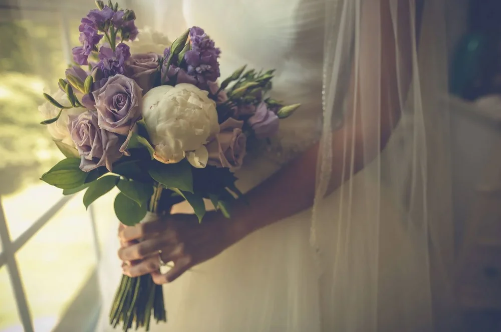 Bride portrait with bouquet of flowers