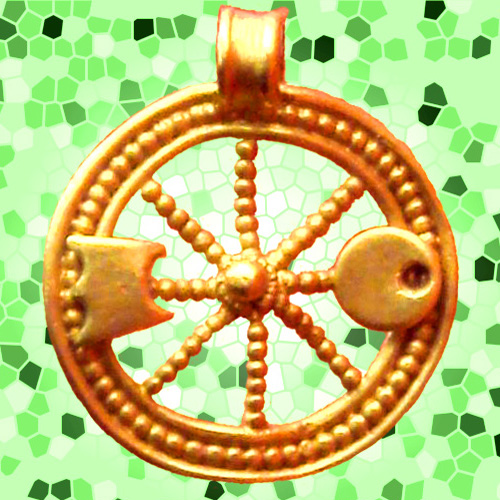 Celtic Wheel of the Sun pendant. Photograph by PHGCOM .