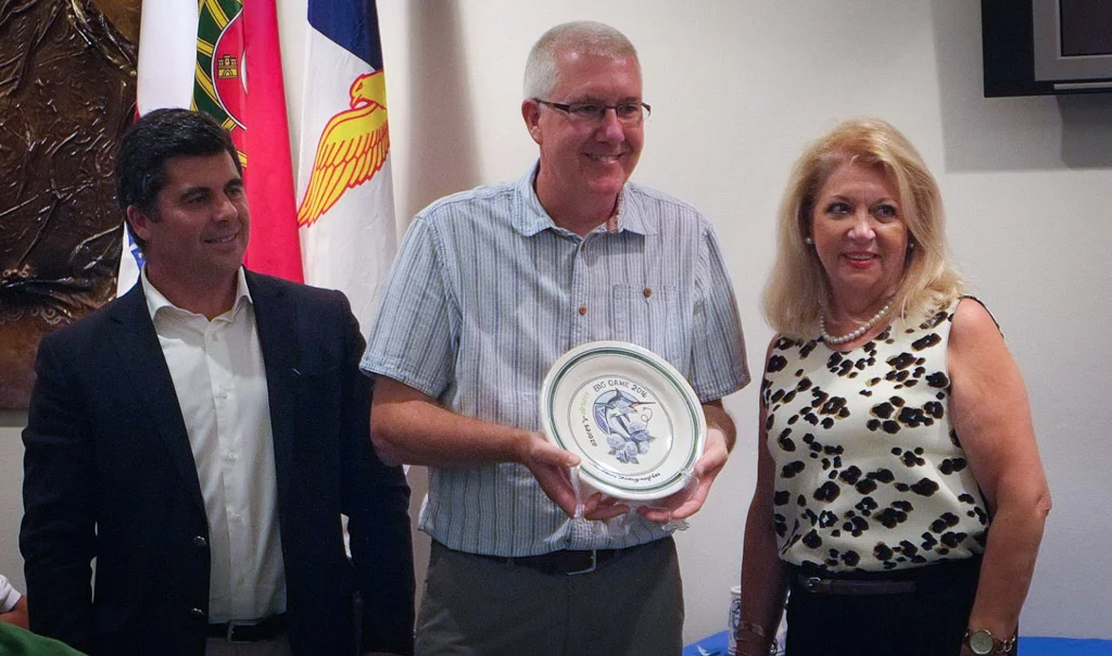 Accepting the photo competition winners plate.