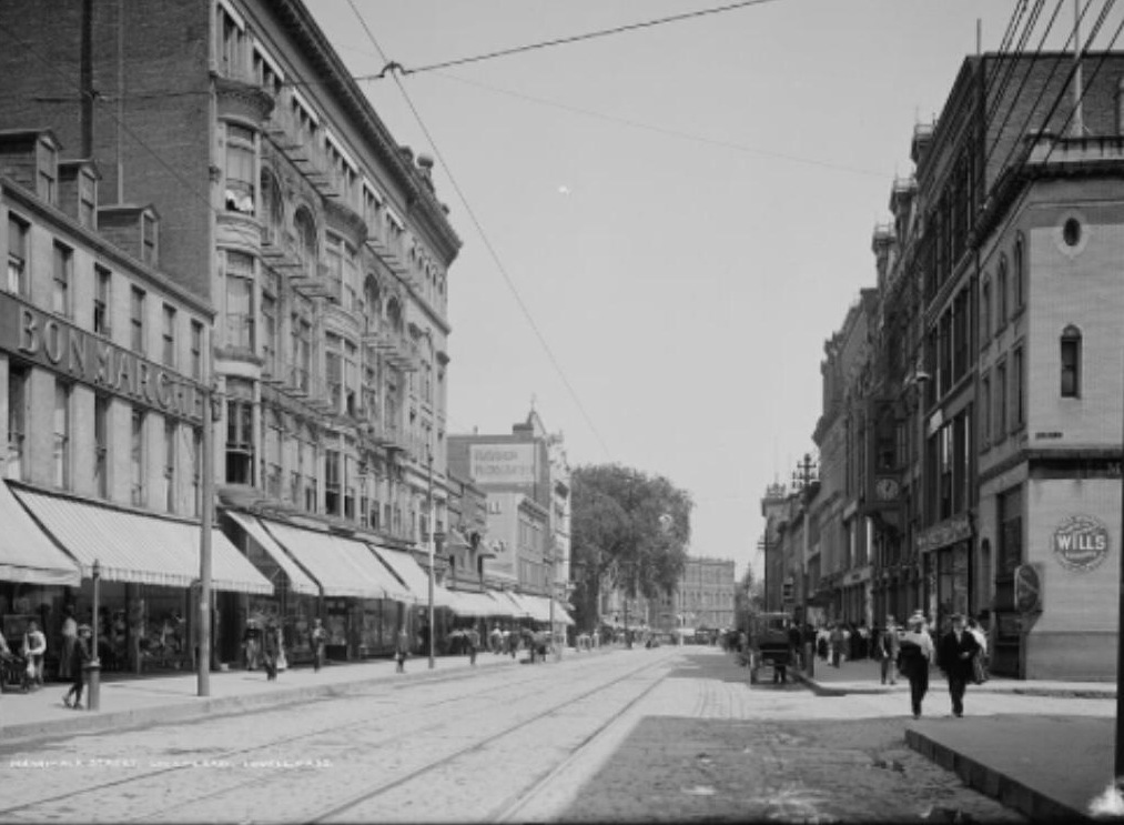 Merrimack Street Lowell, outside of our original offices, at the turn of last century