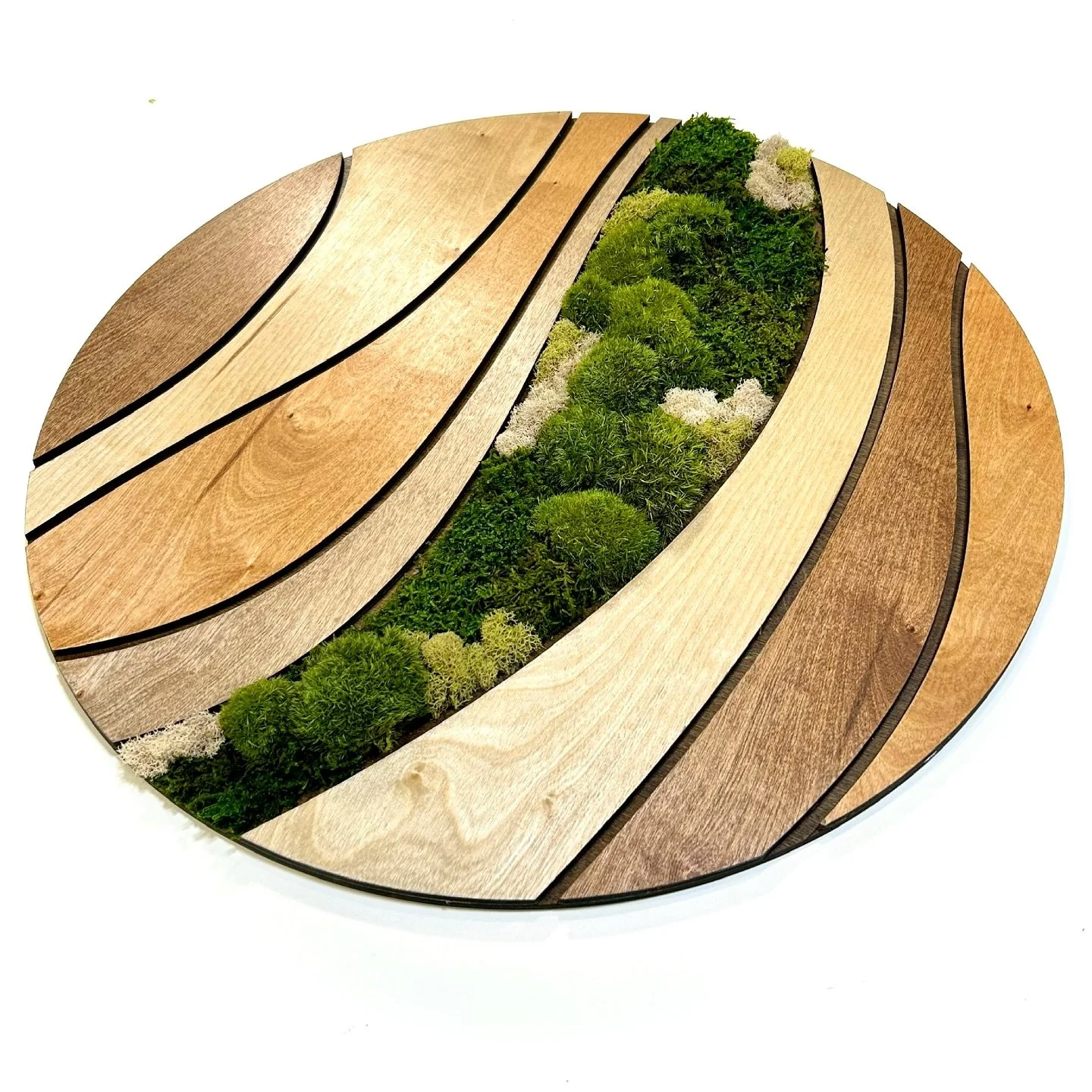 The artwork that inspired our latest project for @rtiashow This piece blends laser-cut wood with preserved moss, creating a unique juxtaposition between technical precision and natural elements. We&rsquo;re taking this concept further for the upcomin