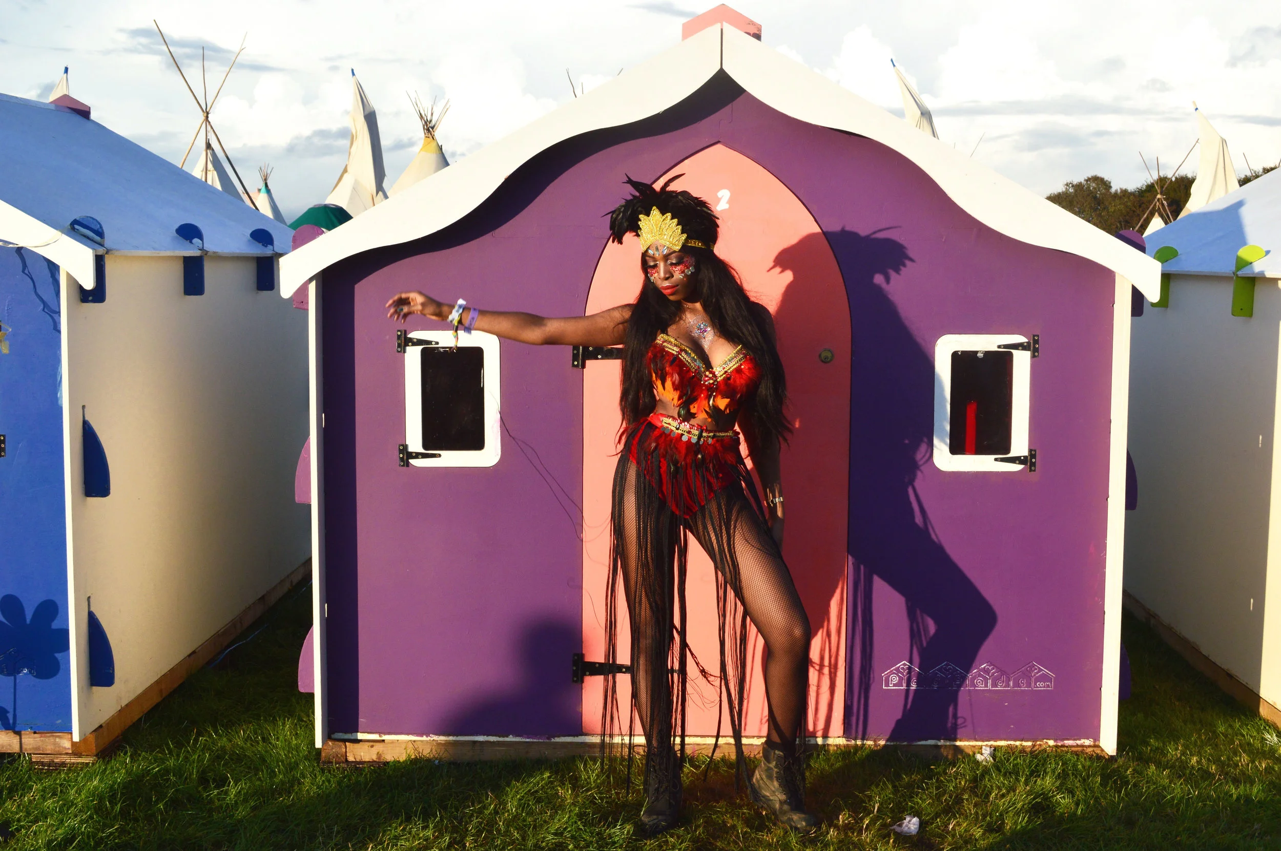 Shop the red feather outfit here