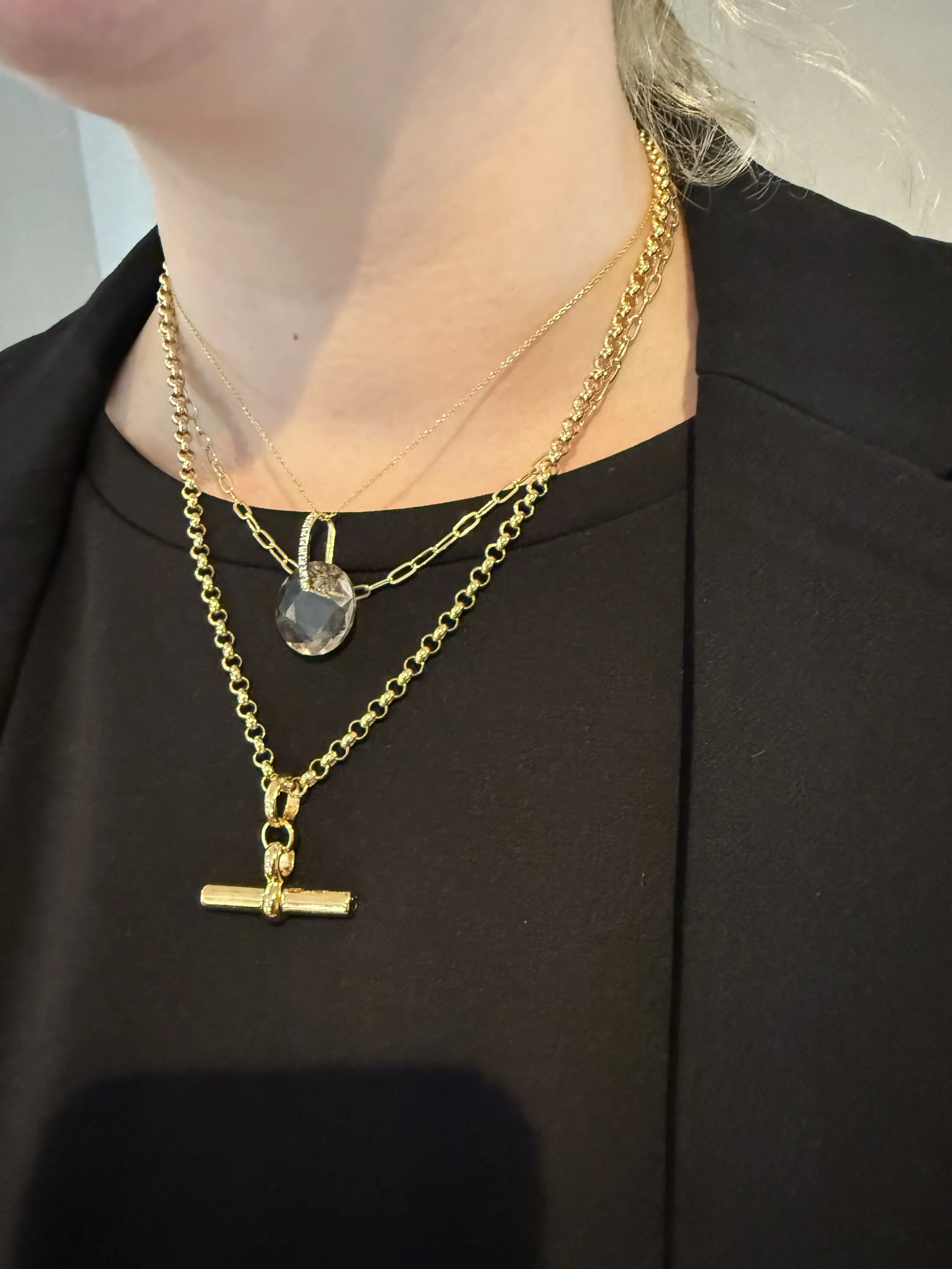 Circle pendant on its own chain