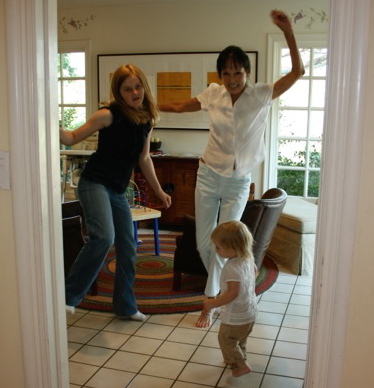 Grace is just a toddler here. Now she is eight and still loves to dance in the kitchen.