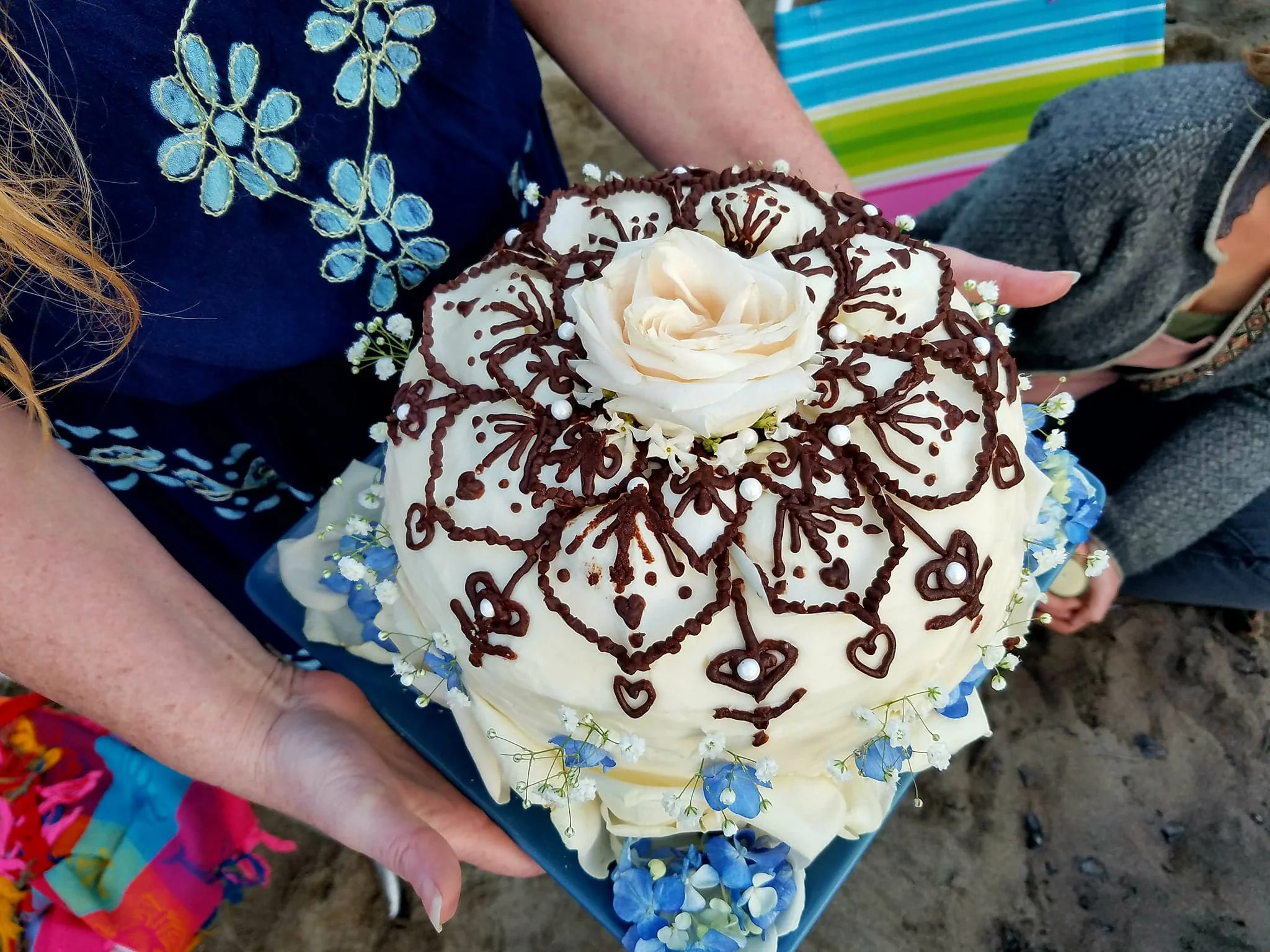 Beautiful cake that looks like a henna'd pregnant belly... by accident! The cake collapsed into a perfect dome shape! Cake by the amazing Julia.