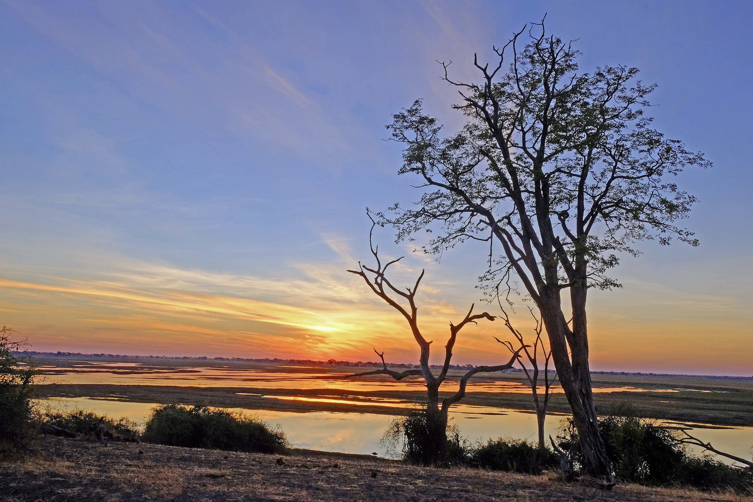 sunset on the chobe river, botswana