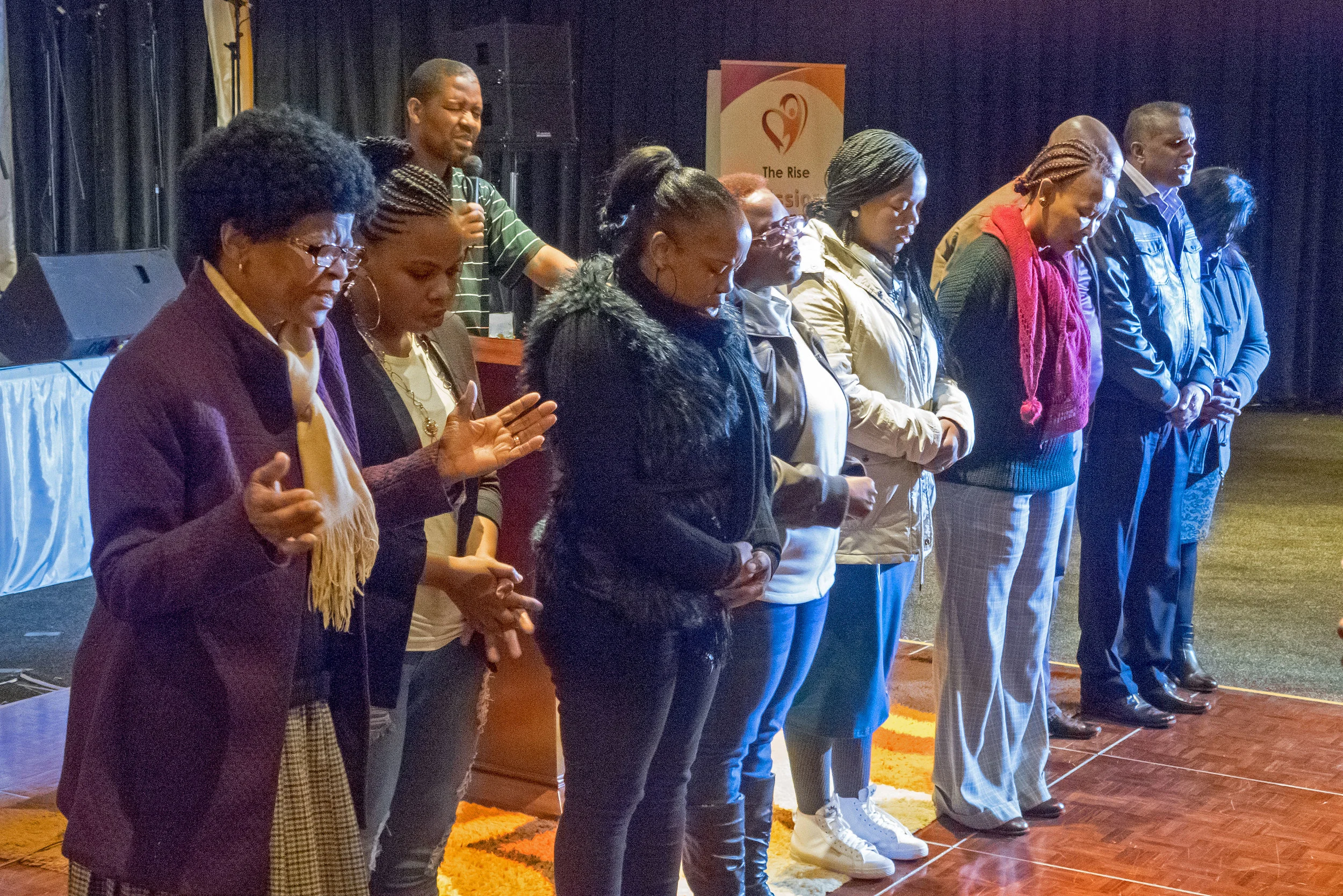 Pastor Isaac Modise Praying for the Mission Team Soon Heading to Mozambique.