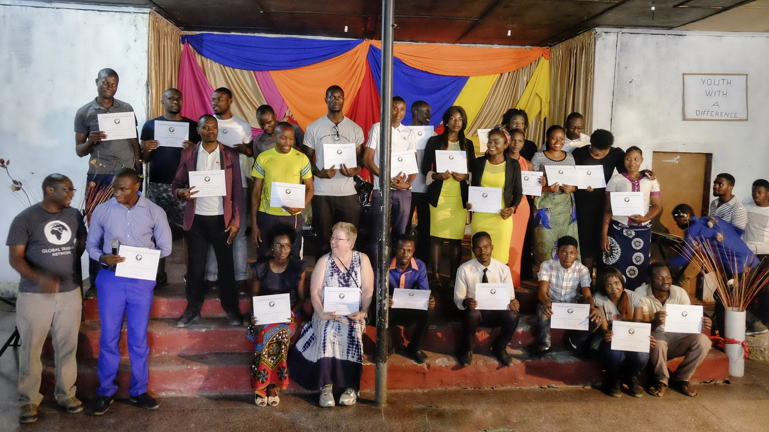 Our Mongu students proudly hold their Certificates of Completion after a week of intensive training! 