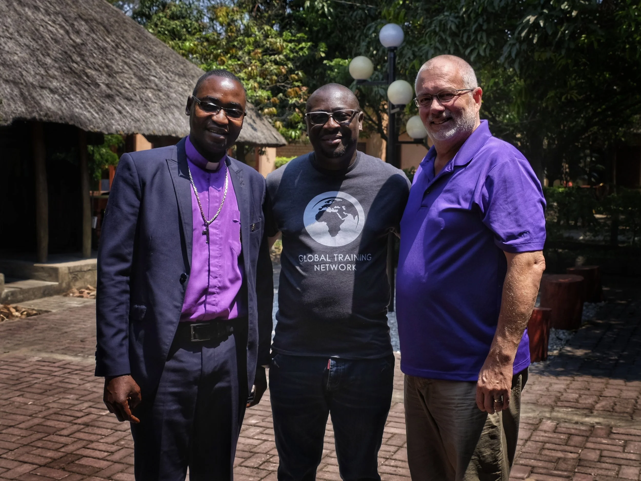 Bishop Manyando (L) with Percy and Doug