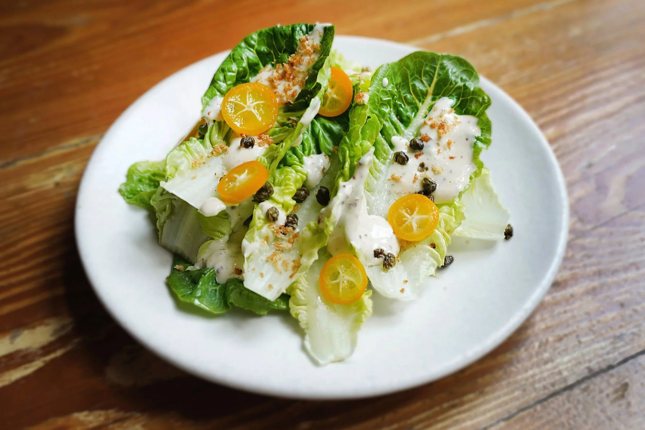 Kumquat Caesar Salad $13