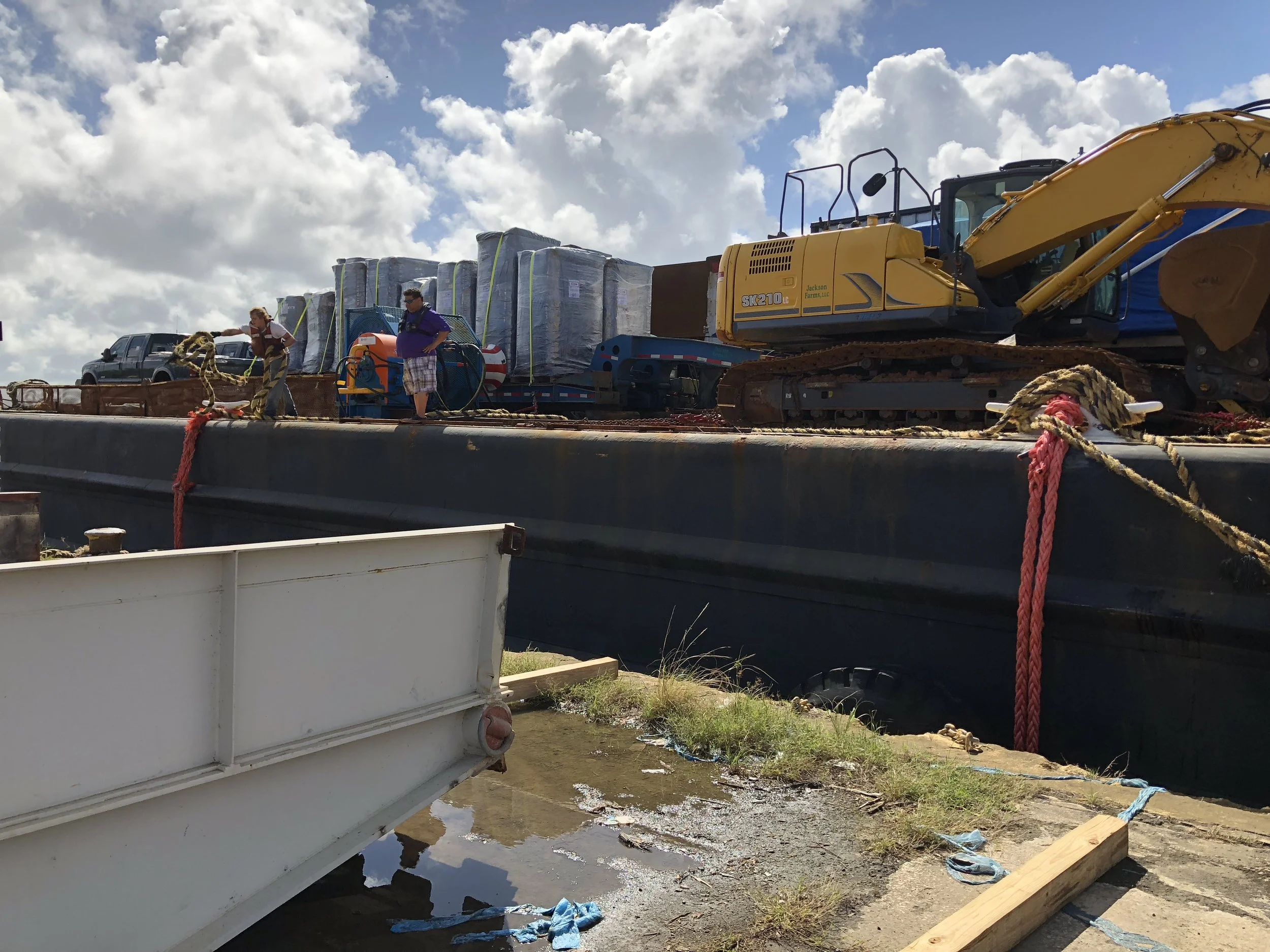 Large steel ramp is positioned an the starboard side so the cargo can be rolled off.