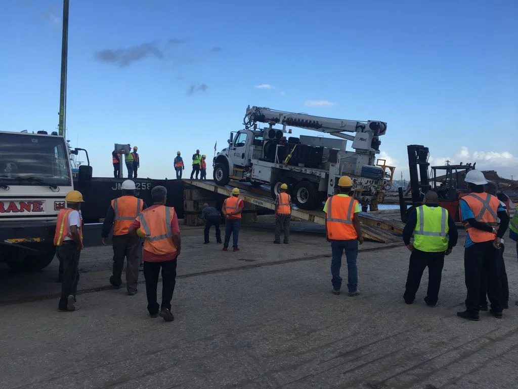 Large union gang watching as we load the first Duke energy truck