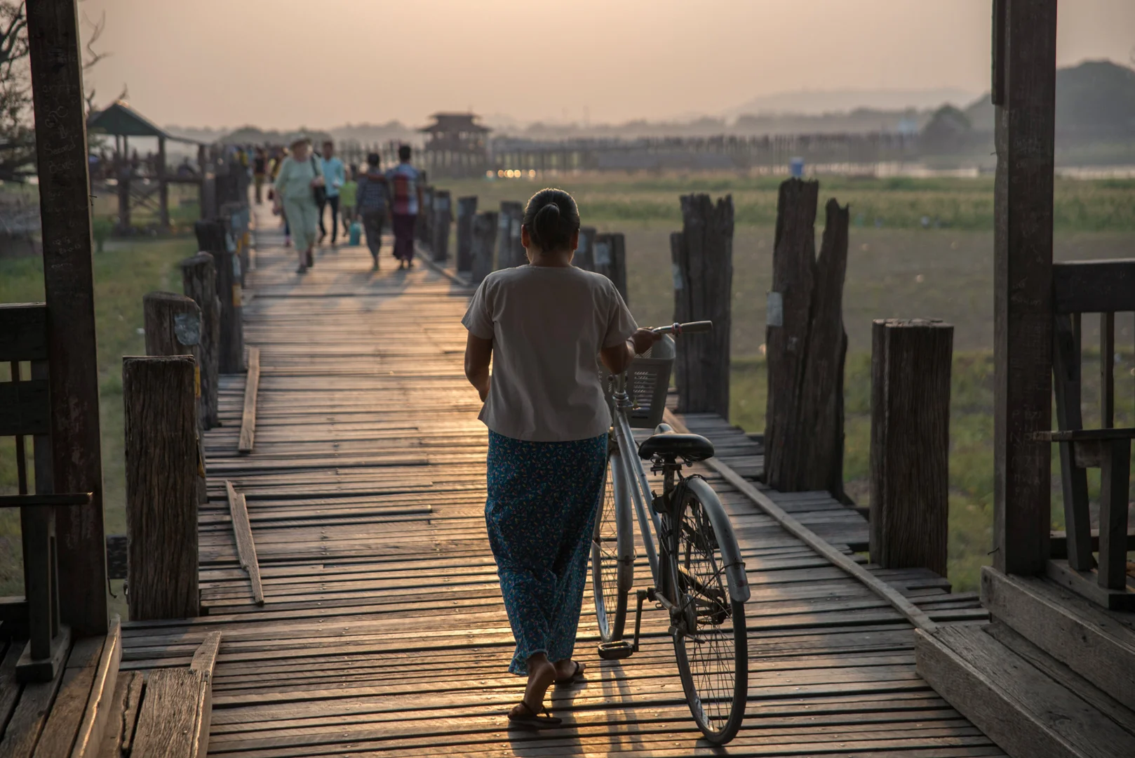 Bike woman on the bridge