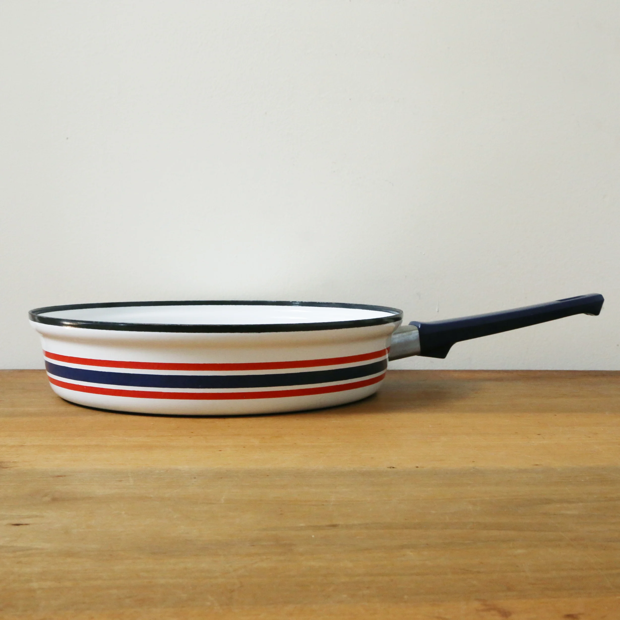 vintage celebration norway cathrineholm era red white and blue frying pan home decor // found by a prop stylist // courtney dawley