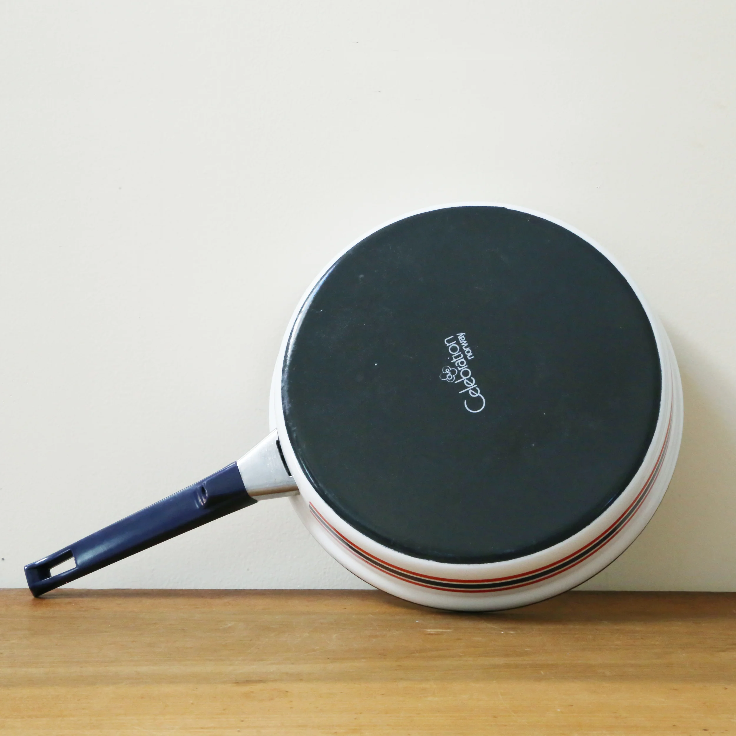 vintage celebration norway cathrineholm era red white and blue frying pan home decor // found by a prop stylist // courtney dawley