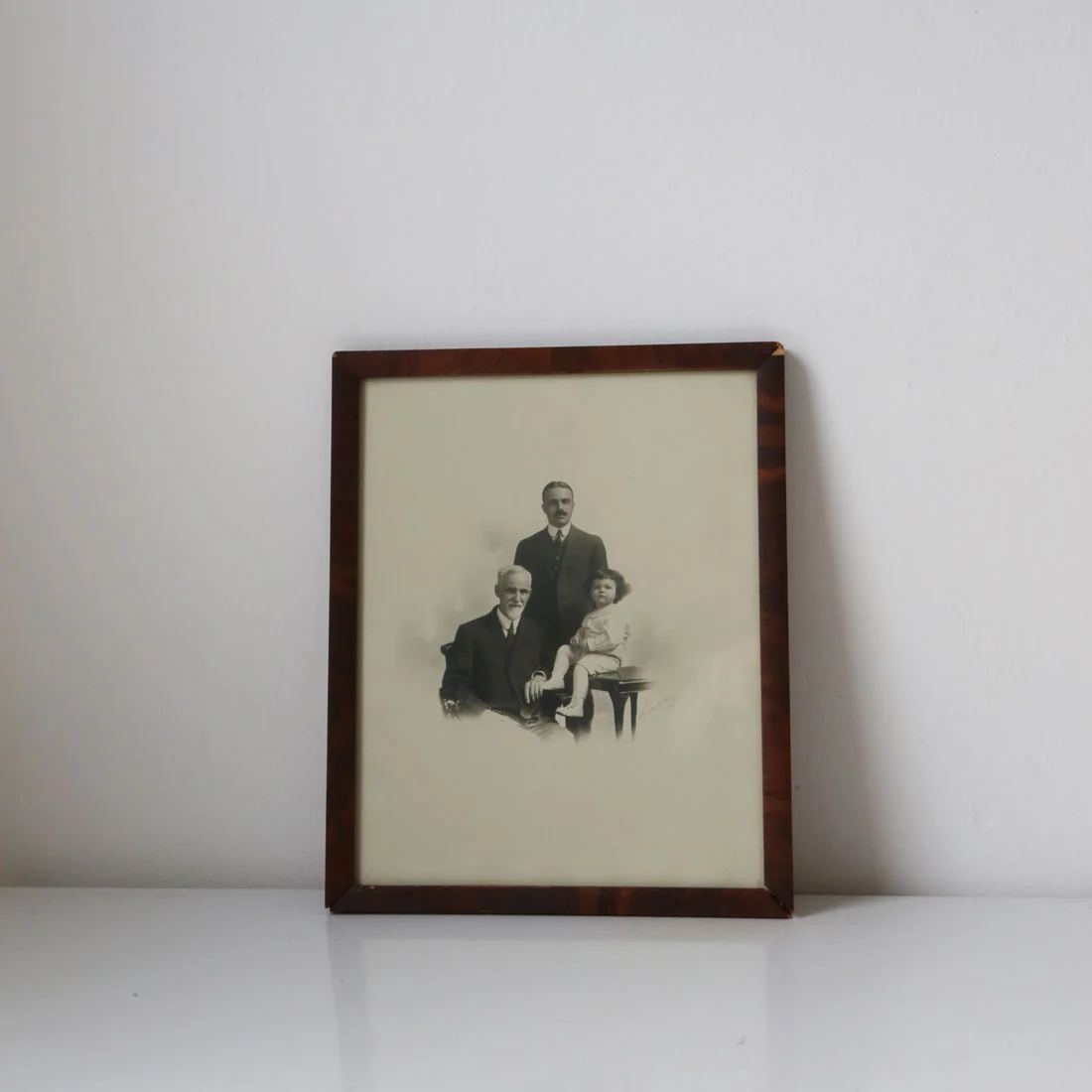 Antique framed black and white family photo $35 // found by a prop stylist // courtney dawley