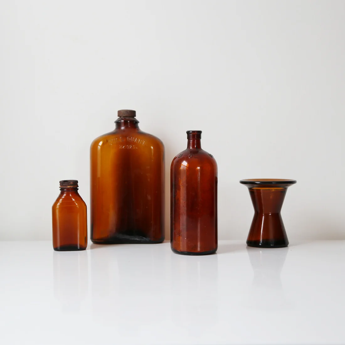 Vintage amber glass collection set of 4 // courtney dawley // found by a prop stylist