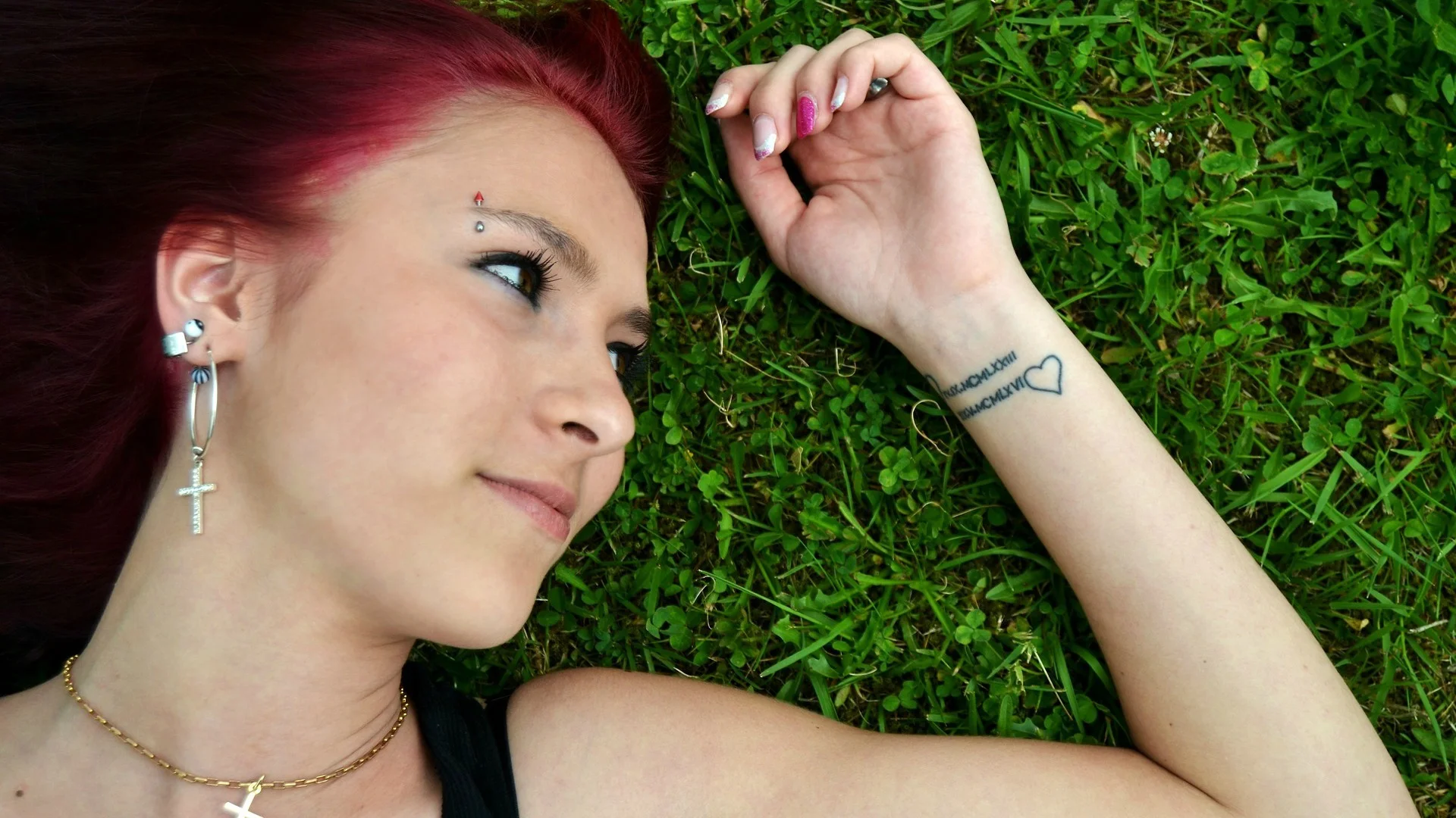 girl with wrist tattoo