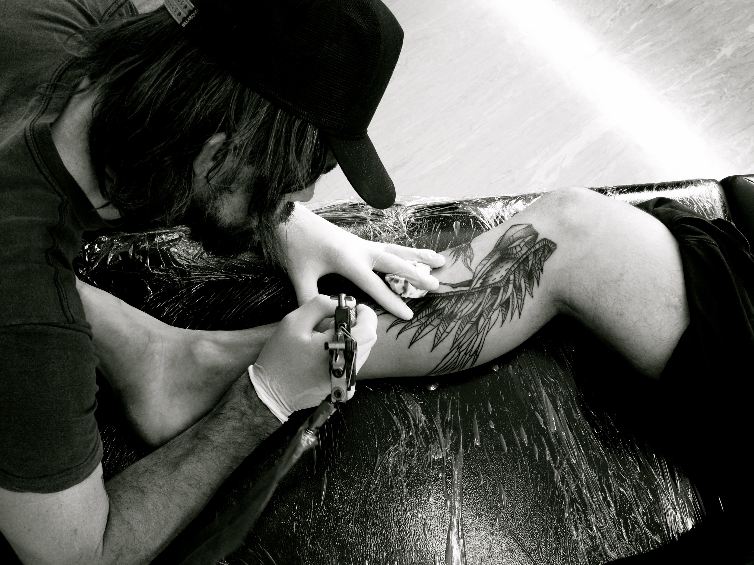 tattoo artist at work