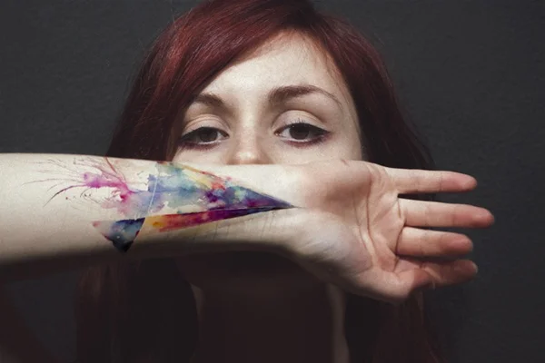 woman with colourful tattoo