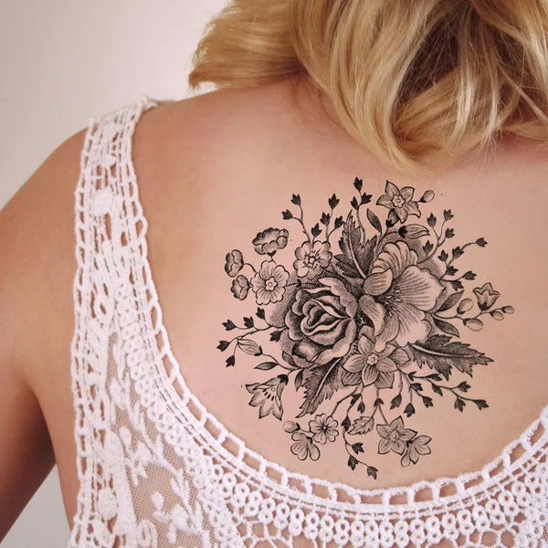flower tattoo upper back