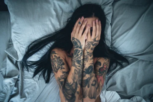 woman with tattooes