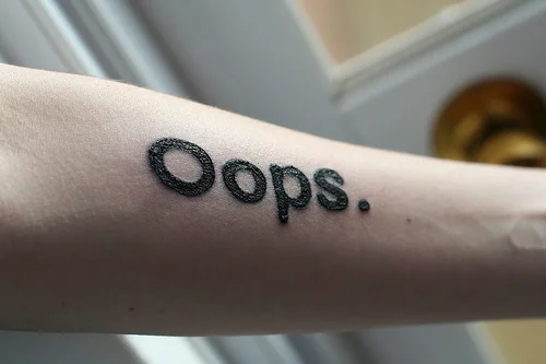oops tattoo