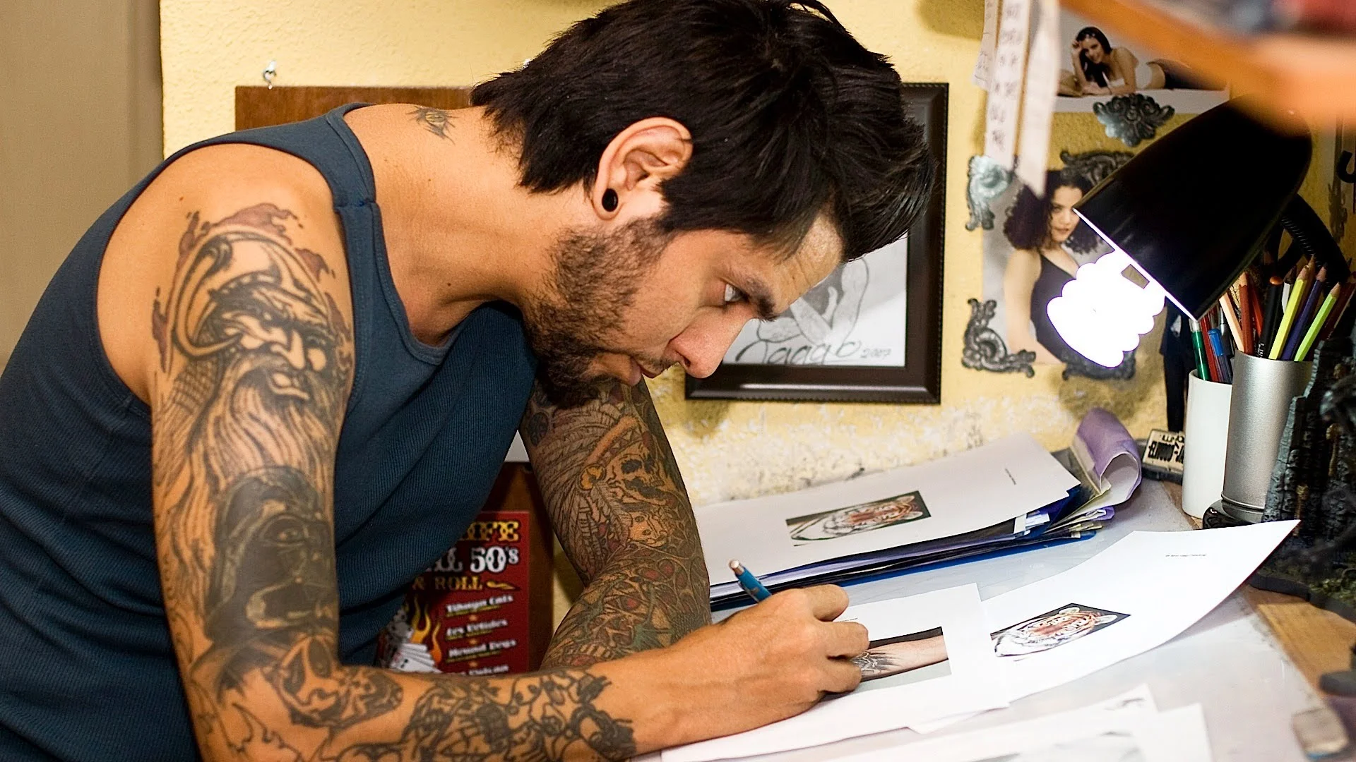 tattoo artist designing