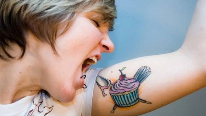 girl with a cupcake tattoo