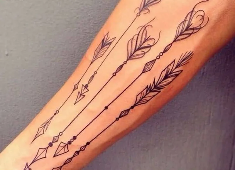 arrow tattoos on the arm