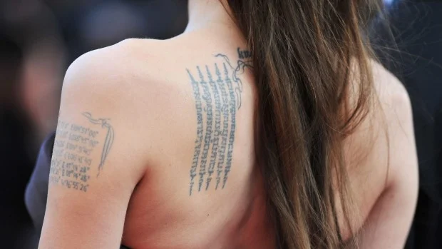 woman back tattoo