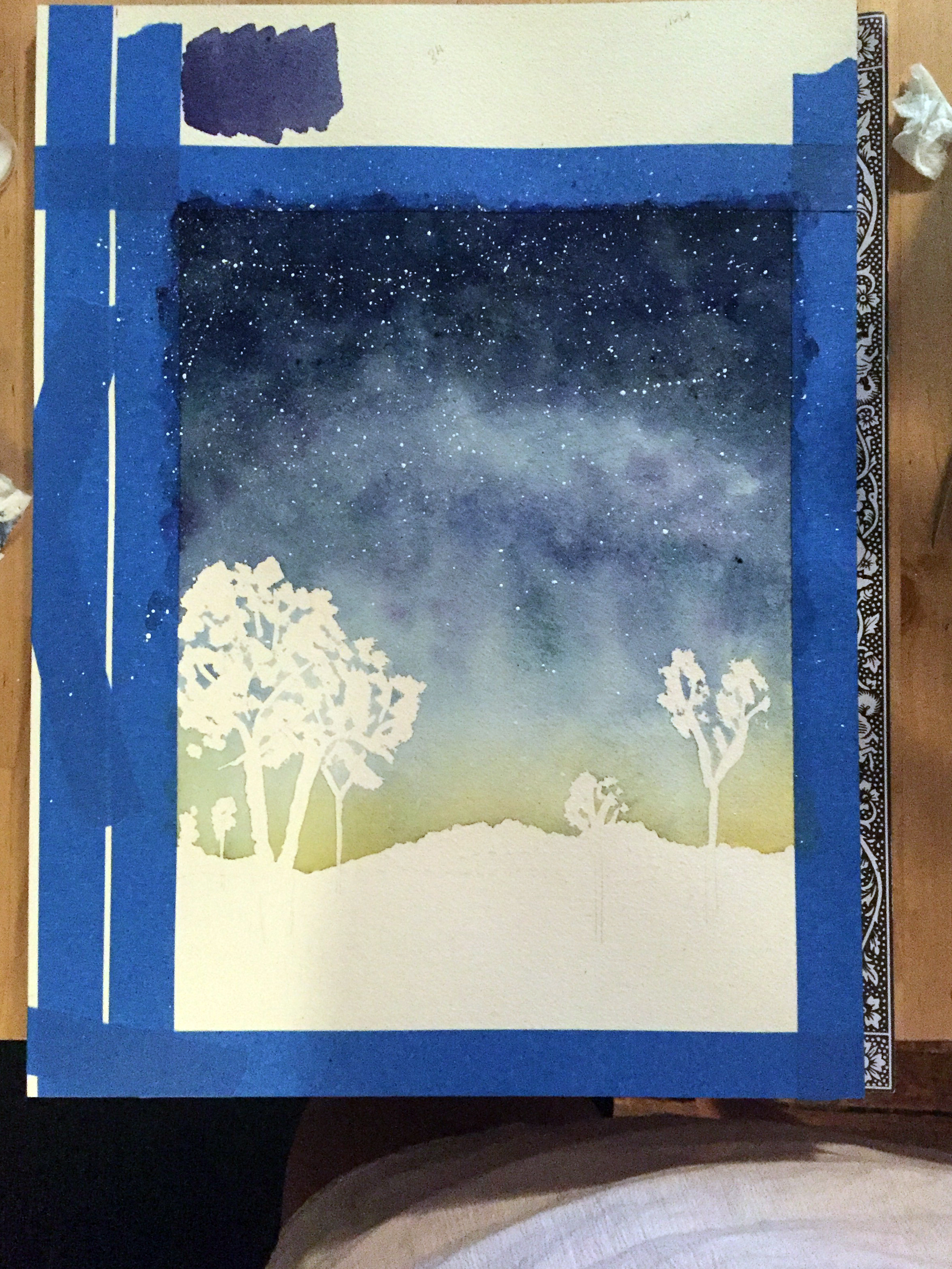  Step 2: Once the sky is complete, gently splatter white paint to represent the stars. Once this is dry, carefully remove the masking fluid.  