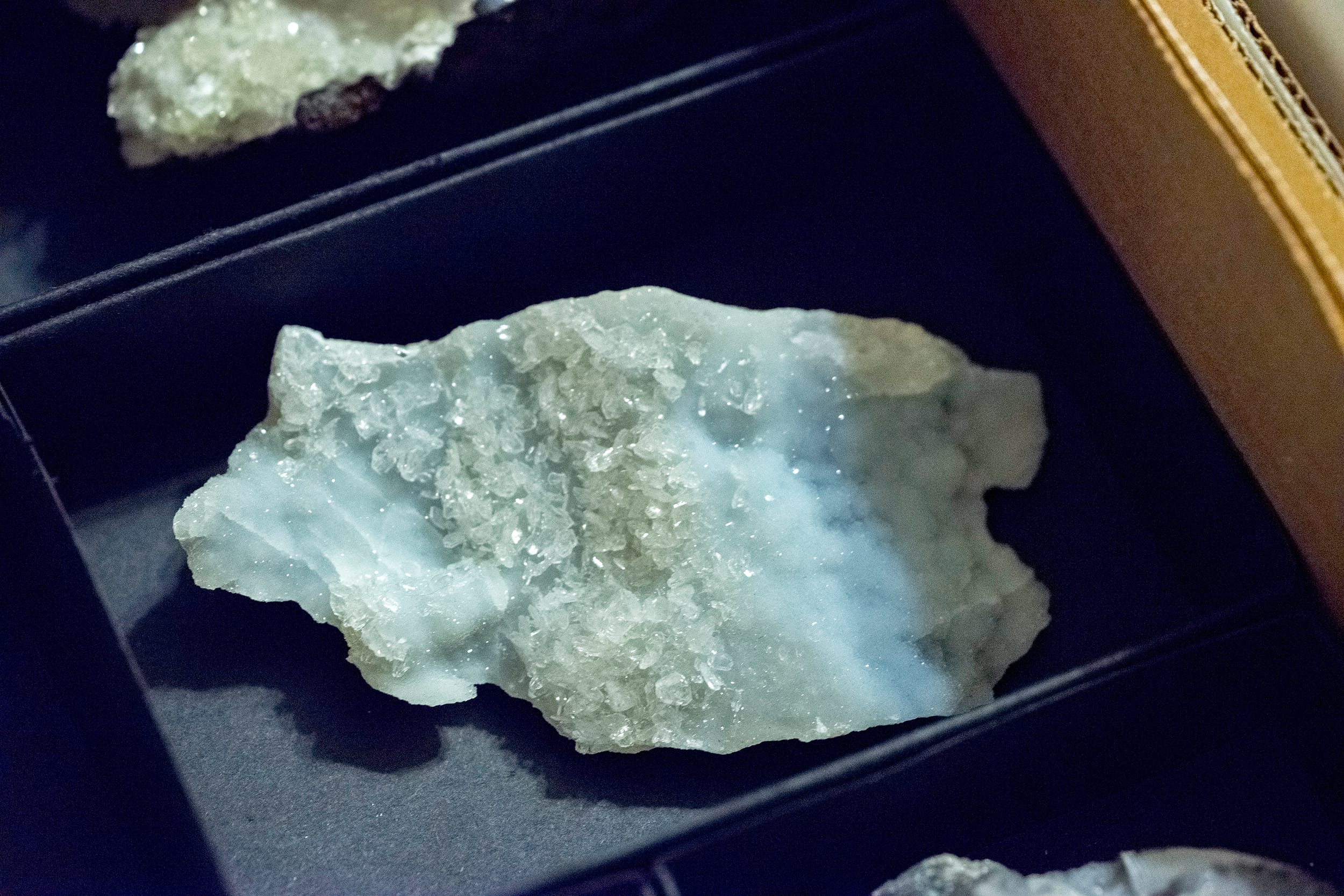 Clear hemimorphite on blue smithsonite