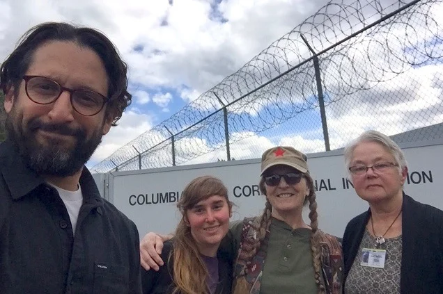 Cornelius with volunteers with Liberation Literacy at the Columbia River Correctional Institute.