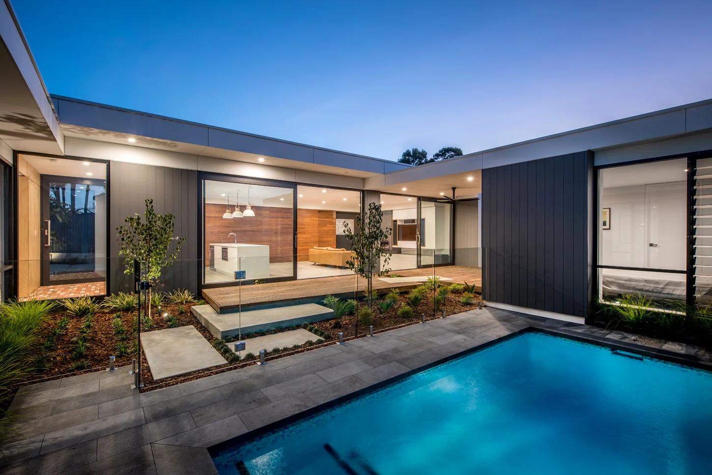 An internal courtyard that's ideal for indoor/outdoor living at a custom build by Arklen.