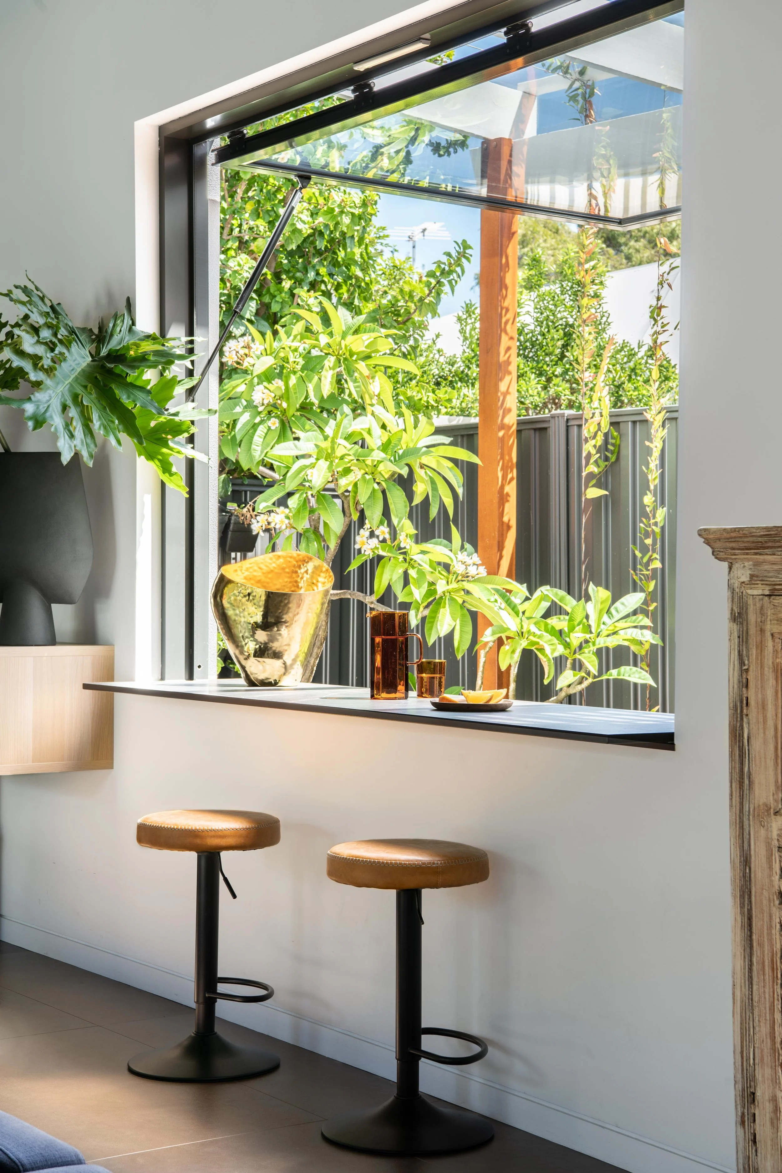 A pass-through window connects the living area to the small alfresco.&nbsp;