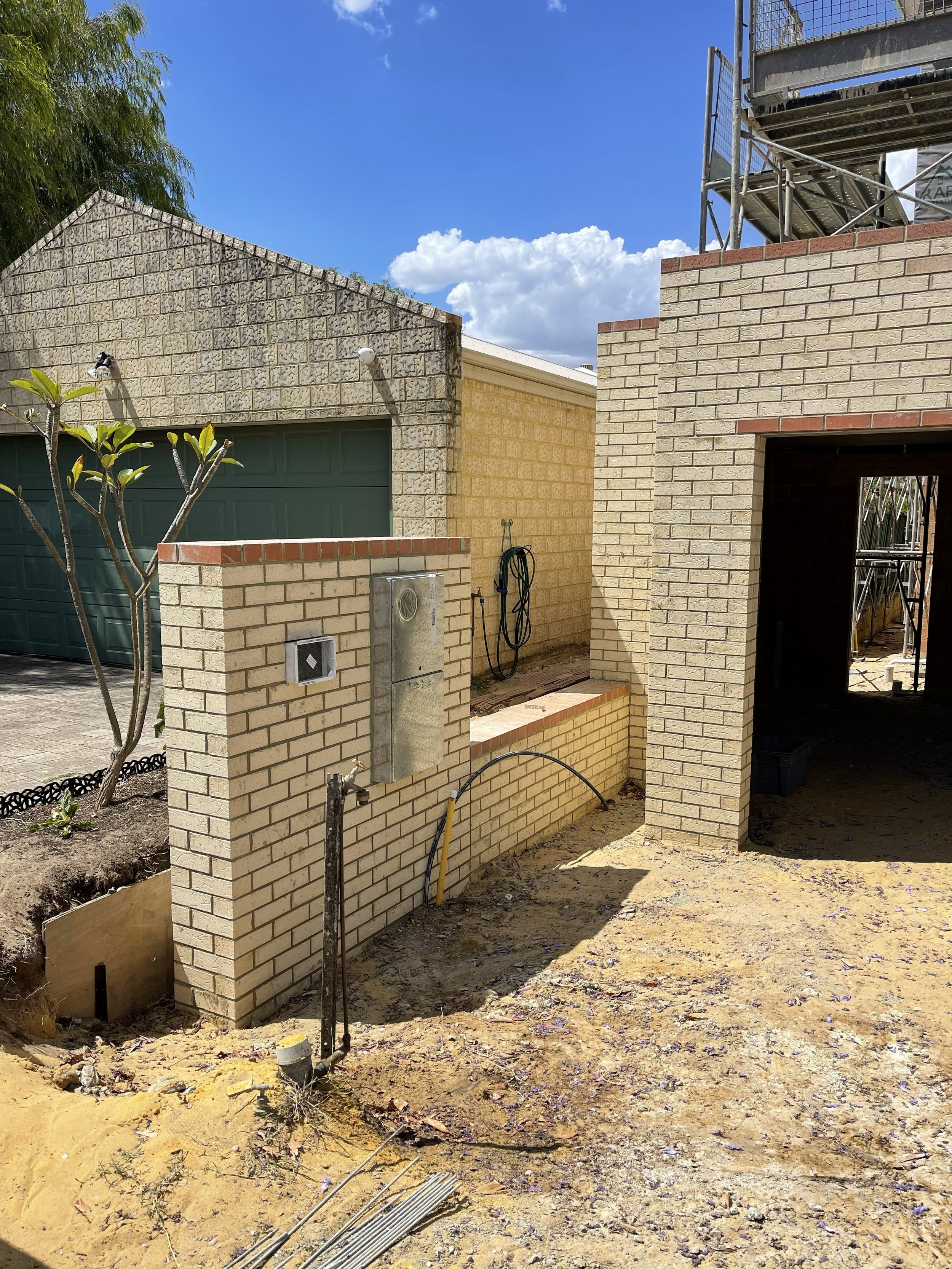 A&nbsp; gravity retaining wall that matches the house at Attadale.&nbsp;