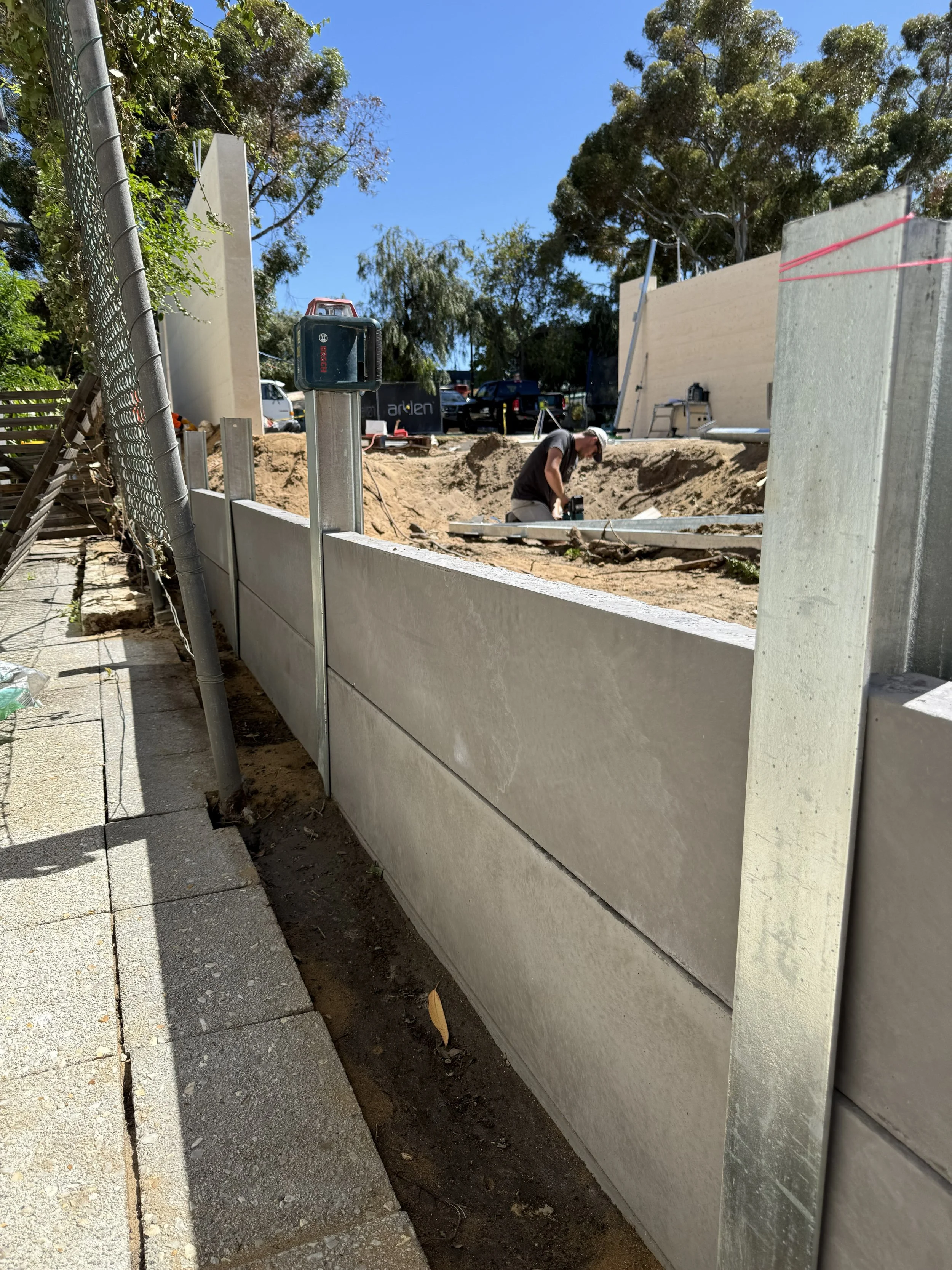 Concrete and steel panel and post.