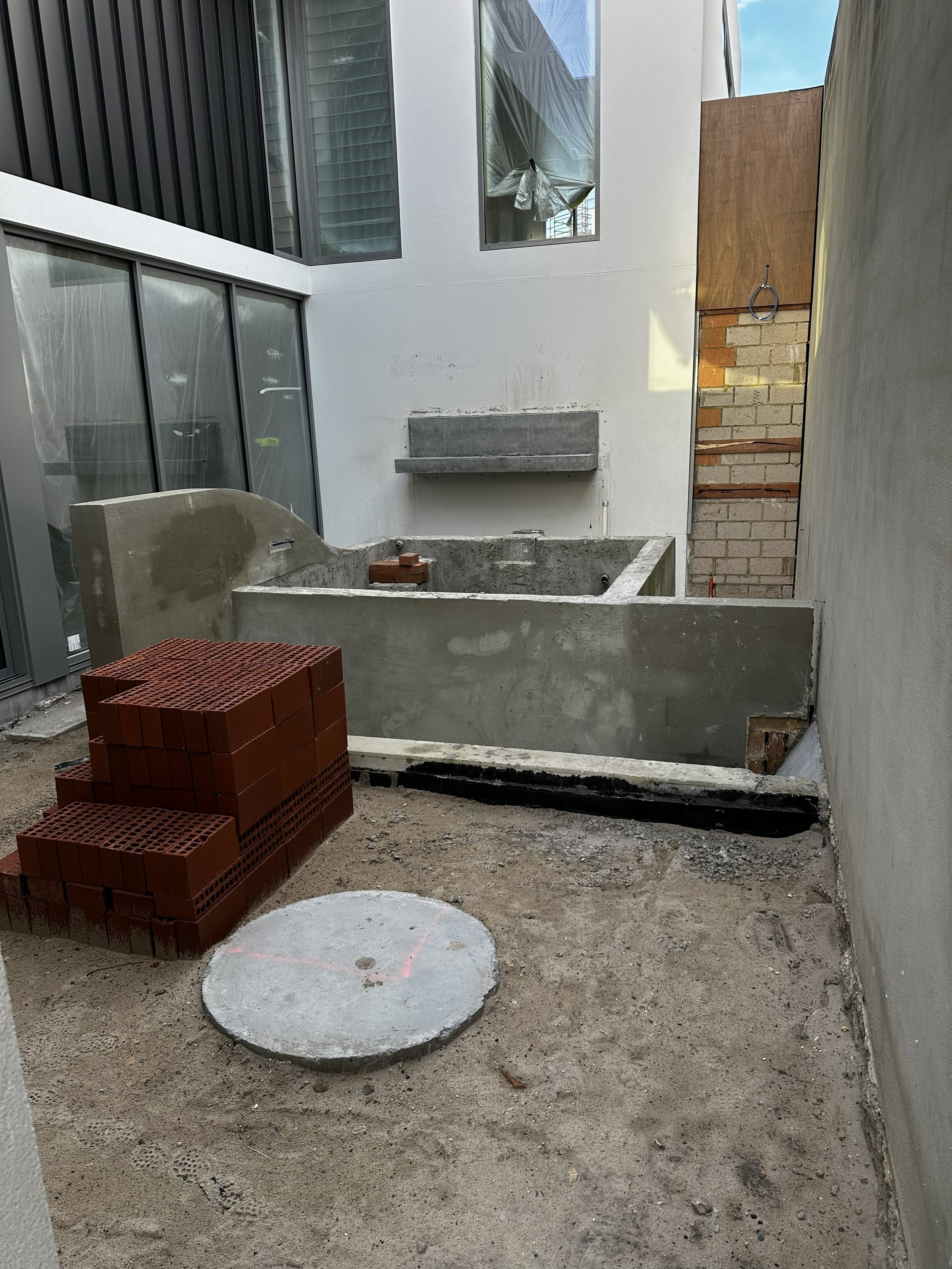 A pool with a stunning curve currently under construction.&nbsp;&nbsp;