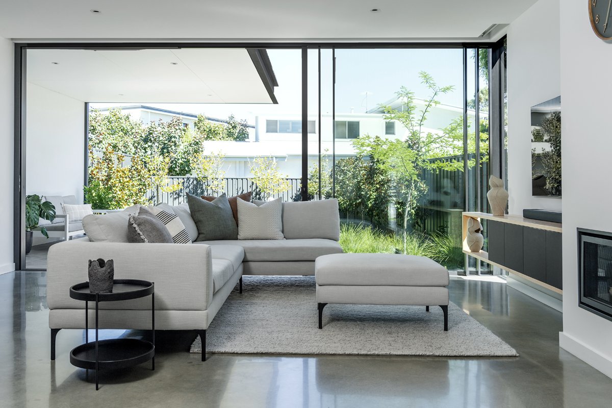 Large floor-to-ceiling sliding doors viewed from the living room of one of Arklen's new home builds.