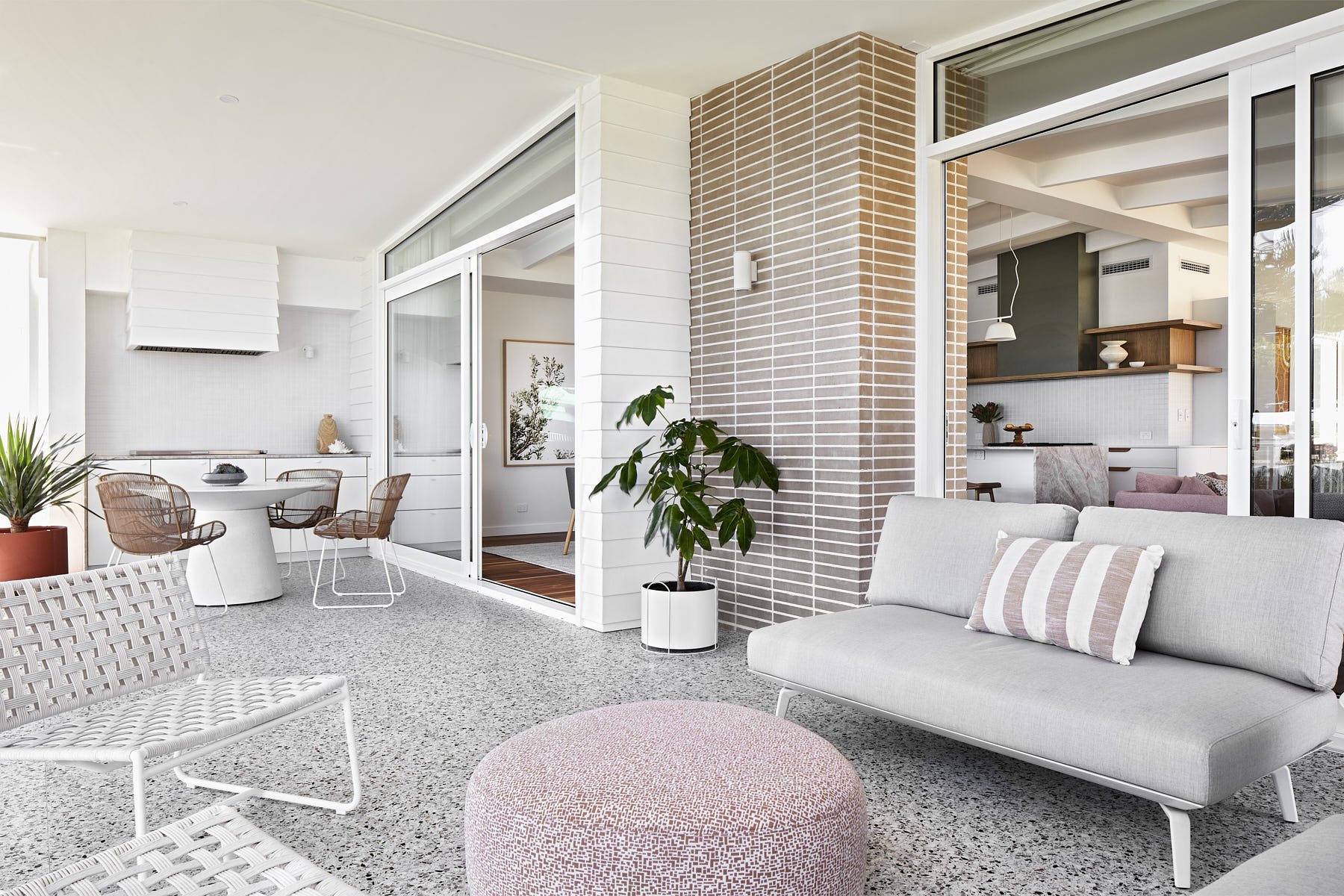 A large balcony with sliding doors leading inside at Arklen's custom build in Mandurah.